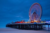 England, Lancashire, Blackpool Blackpool Central Pier at dusk