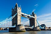 England, Greater London, Pool of London The iconic Tower Bridge which spans the River Thames near the Tower of London