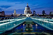 The Millenium Bridge and St Pauls Cathedral at night, London, England