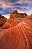 Sandstone formation in Coyote Buttes north area called wave illuminated by sunset light