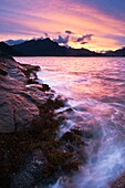 Rugged rocky coastline and mountain view at Stamsund, Vestvågøy, Lofoten islands, Norway