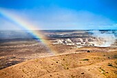rainbow over actively erupting Halemaumau Crater, releasing vog - volcanic gas, Kilauea Caldera, Hawaii Volcanoes National Park, Kilauea, Big Island, Hawaii, USA