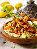 Couscous with Mediterranean roast vegetables and chicken kebabs
