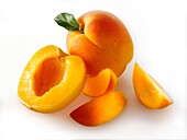 Fresh apricots whole and cut in halves