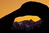 North America, USA, California, Lone Pine Mt Whitney viewed through Mobius Arch in the Alabama Hills