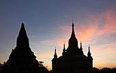 Myanmar, Burma, Bagan, temples silhouette at sunset