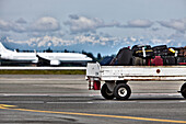 Luggage Trailer on the Airport Tarmac, Seattle, WA