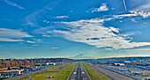 Airplane Landing On Runway, Seattle, WA US