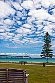 Park Overlooking a Shoreline and Bridge, Mackinac Island, Michigan, US