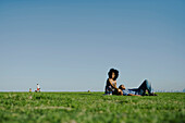 Young couple relaxing together in park