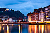 Lights Reflecting on Canal With Bridge and Hillside Castle in Background, Germany