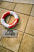 Pool Closed Sign and Life Presever