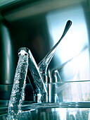 Water Pouring Out Of Kitchen Faucet