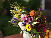 Bunch of Autumn flowers with sunflowers, dahlias and asters, Bavaria, Germany