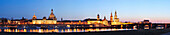 View over river Elbe to illuminated old town, Dresden, Saxony, Germany