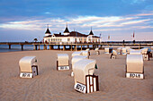 Beach chairs and pier in the evening, Ahlbeck seaside resort, Usedom island, Baltic Sea, Mecklenburg-West Pomerania, Germany