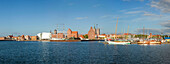 Panoramic view with Ozeaneum,  warehouses and sailing boats at harbour, St  Nicholas church in the background, Stralsund, Baltic Sea, Mecklenburg-West Pomerania, Germany, Europe