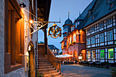 View from the Town Hall to Hotel Kaiserworth, market square in the evening, Goslar, Harz mountains, Lower Saxony, Germany