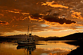 Argentina, Patagonia, Tierra del Fuego, Ushuaia, abandoned boat, sunset