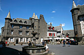 France, Auvergne, Cantal, Salers, Tyssendier d'Escous square, fountain and house from 16th century