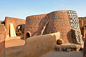 Burkina Faso, village of Tangasomogo, fortified houses in the Tiebélé region on the border of Burkina Faso and Ghana, frescoes on the walls of their mud huts