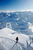 France, Midi-Pyrénées, Hautes-Pyrénées, Pic du Midi de Bigorre, man on snowshoes
