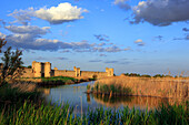 France, Languedoc, Gard, Aigues Mortes, ramparts at sunset, Camargue marsh