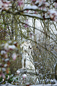 France, Ile de France, Yvelines, Versailles castle, Hercules statue in park in winter
