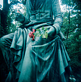 Statue Holding Flowers, Paris, France