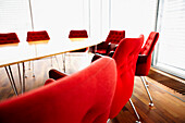 Conference Room Table and Red Chairs