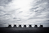 Row of Lifeguard Stations on Beach, Santa Monica, California, USA