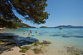 People on the beach in the sunlight, Playa de Formentor, Mallorca, Balearic Islands, Spain, Europe