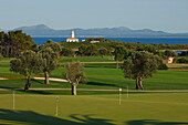View of golf course at the coast, Isla d'Alcanada, Mallorca, Balearic Islands, Spain, Europe