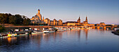 Panoramic view over the Elbe river to Bruehlsche Terrasse, University of visual arts, Frauenkirche, Staendehaus, Dresden castle, Hofkirche and Semper Opera in the evening light, Dresden, Saxonia, Germany, Europe
