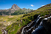 View to Pic du Midi d'Ossau, waterfall in foreground, Ossau Valley, French Pyrenees, Pyrenees-Atlantiques, Aquitaine, France