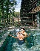 Watsu treatment in an outdoor pool, Vigilius Mountain Resort, Vigiljoch, Lana, Trentino-Alto Adige/Suedtirol, Italy