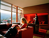 Hotel guestes in piazza lounge, Vigilius Mountain Resort, Vigiljoch, Lana, Trentino-Alto Adige/Suedtirol, Italy