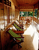 Wooden patio of Bois D'Amour Guesthouse central La Digue, La Digue and Inner Islands, Republic of Seychelles, Indian Ocean
