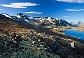 Mountains und lake under blue sky, Jotunheimen National Park, Gravdalen, Norway, Europe