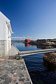 Houses along the coast in Loshamn harbour, Rogaland, Norway