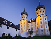 Illuminated Cistercian monastery Stams in the evening, Inntal, Tyrol, Austria, Europe