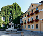 Hostel Hababusch with a statue in the foreground, Geleit Street, Weimar, Thuringia, Germany