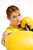 Portrait of a female boxer in a boxing stance