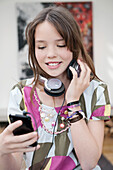 Girl listening to an MP3 player