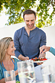 Friends enjoying lunch at a dining table