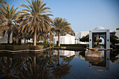 Palm trees and tranquil ponds, The Chedi Muscat hotel, Muscat, Masqat, Oman, Arabian Peninsula