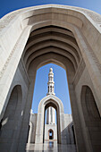 Archway and minaret at Sultan Qaboos Grand Mosque, Muscat, Masqat, Oman, Arabian Peninsula
