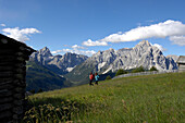 Two hikers, Sexten valley, Sexten Dolomites, Puster valley, UNESCO World Nature Site, Dolomites, South Tyrol, Trentino-Alto Adige, Italy