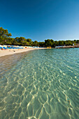 Clear blue water of La Basse beach, Ibiza, Spain.