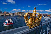 Golden Crown on Skeppsholmsbron Bridge, Skeppsholmen, Stockholm, Sweden.